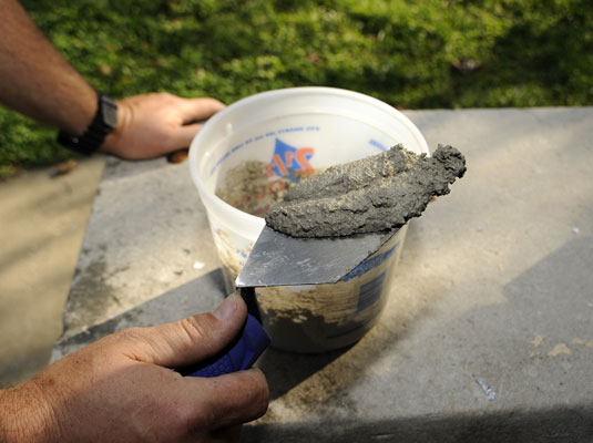 Comment réparer le mortier sur les murs de briques