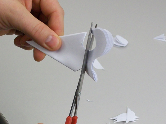 Comment faire un flocon de neige en papier à cinq pointes