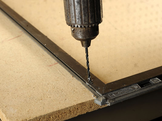 Comment remplacer une vitre dans une fenêtre à cadre en métal avec support en L