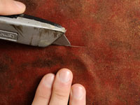 Comment réparer les bulles de papier peint