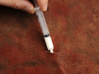 Comment réparer les bulles de papier peint