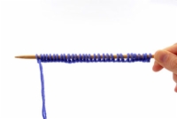 Comment tricoter en rond avec des aiguilles doubles pointes