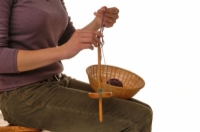 Comment faire du fil à deux plis sur une broche à main