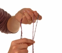 Comment faire du fil à deux plis sur une broche à main
