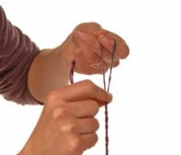 Comment faire du fil à deux plis sur une broche à main