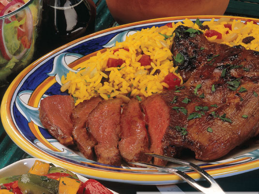 Gigot d'agneau en papillon avec vinaigrette au miel et à la moutarde