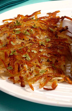Recette de pommes de terre rissolées aux oignons râpés et aux pommes de terre