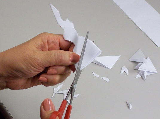 Comment faire un flocon de neige en papier à huit pointes